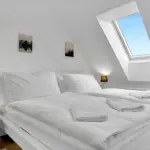 Ložnice apartm&aacute;nov&eacute;ho domu U Pivovaru