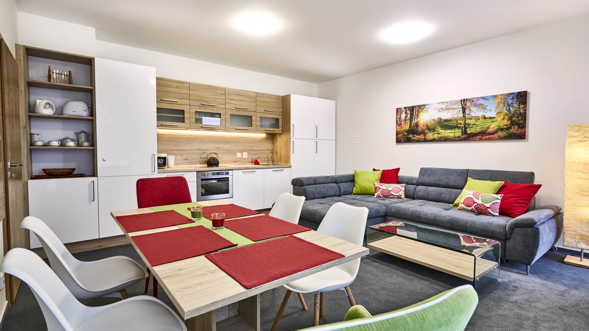 Obývací pokoj s kuchyňskou linkou apartmánu A3