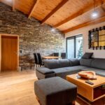 Obývací pokoj s kuchyňským koutem apartmánu B23