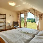 Ložnice apartm&aacute;nov&eacute;ho domu Chalupa pod Ple&scaron;ivcem